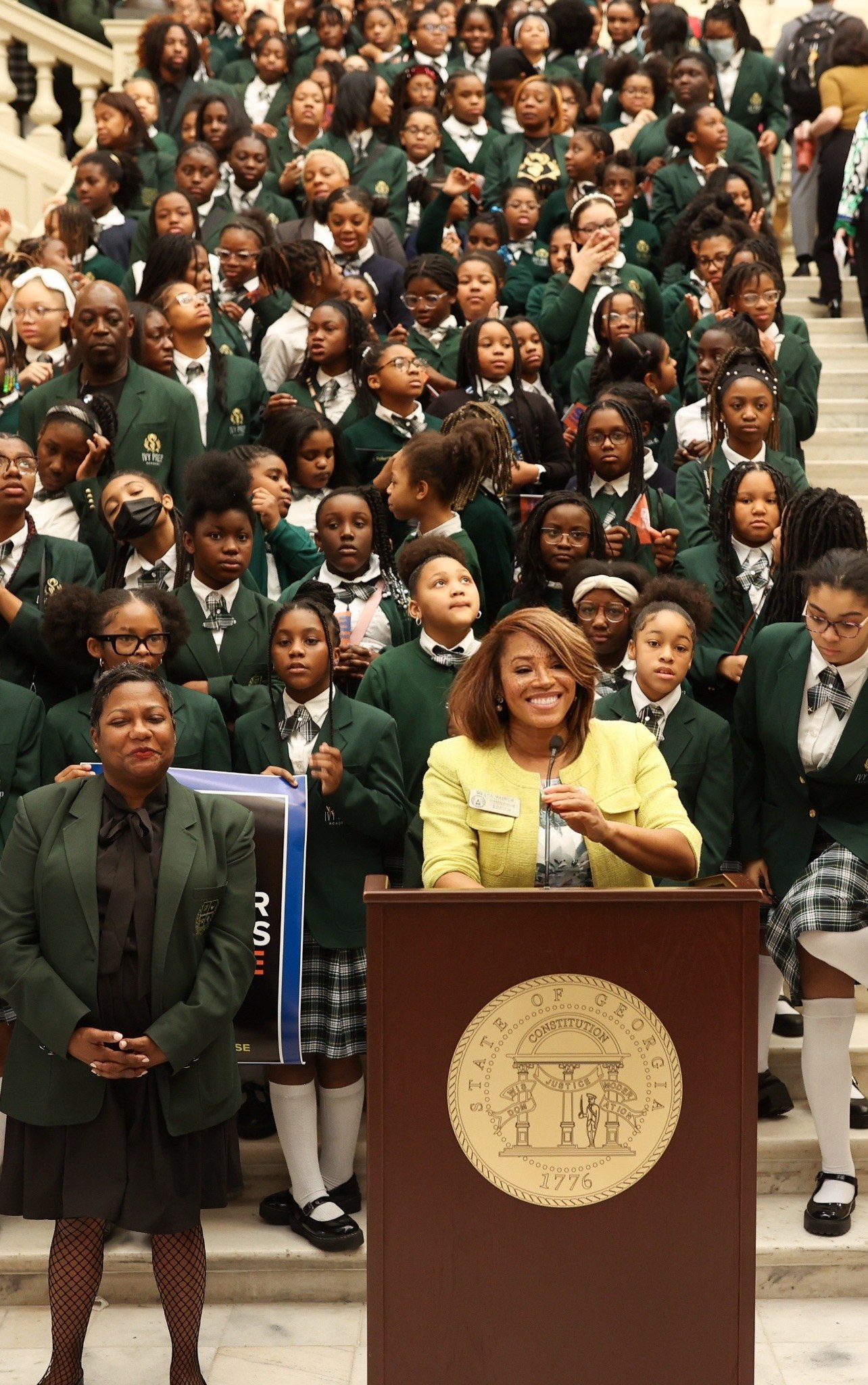 Mesha Mainor speaking to students at the Georgia State Capitol
